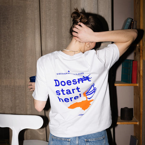 T-Shirt  “Discovering New Places Does Start Here”